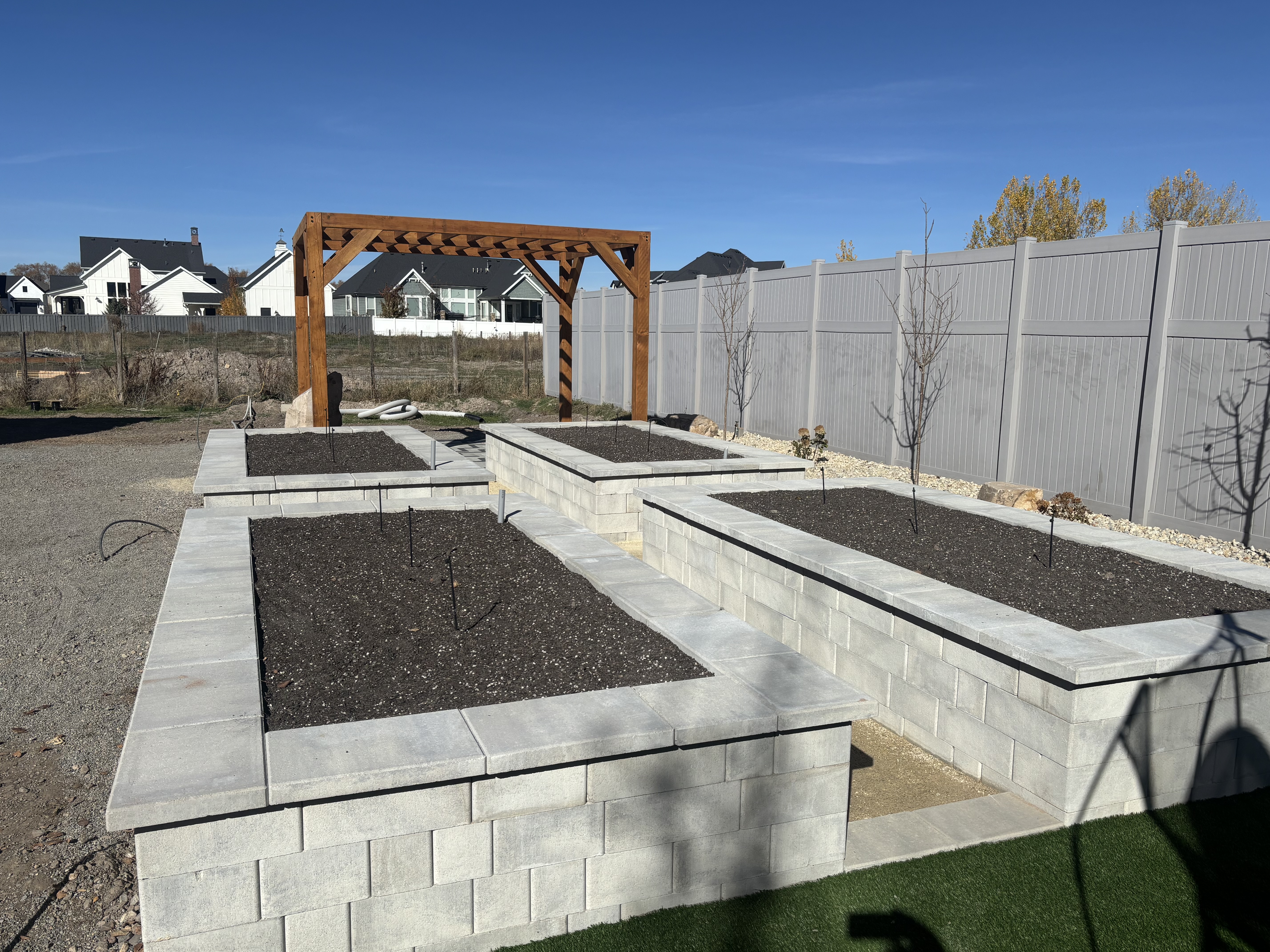 Raised block planter beds with pergola