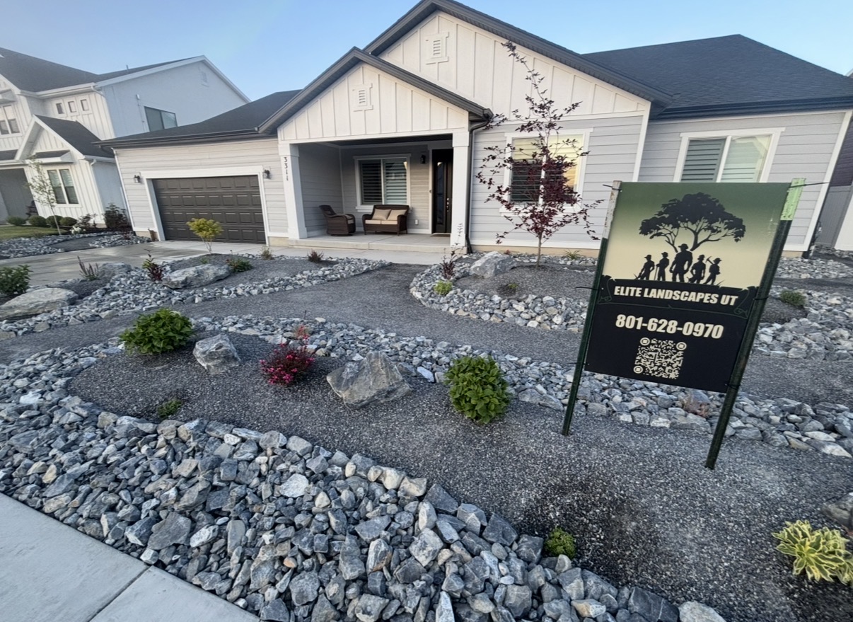 Modern home with xeriscape and decorative rock front yard