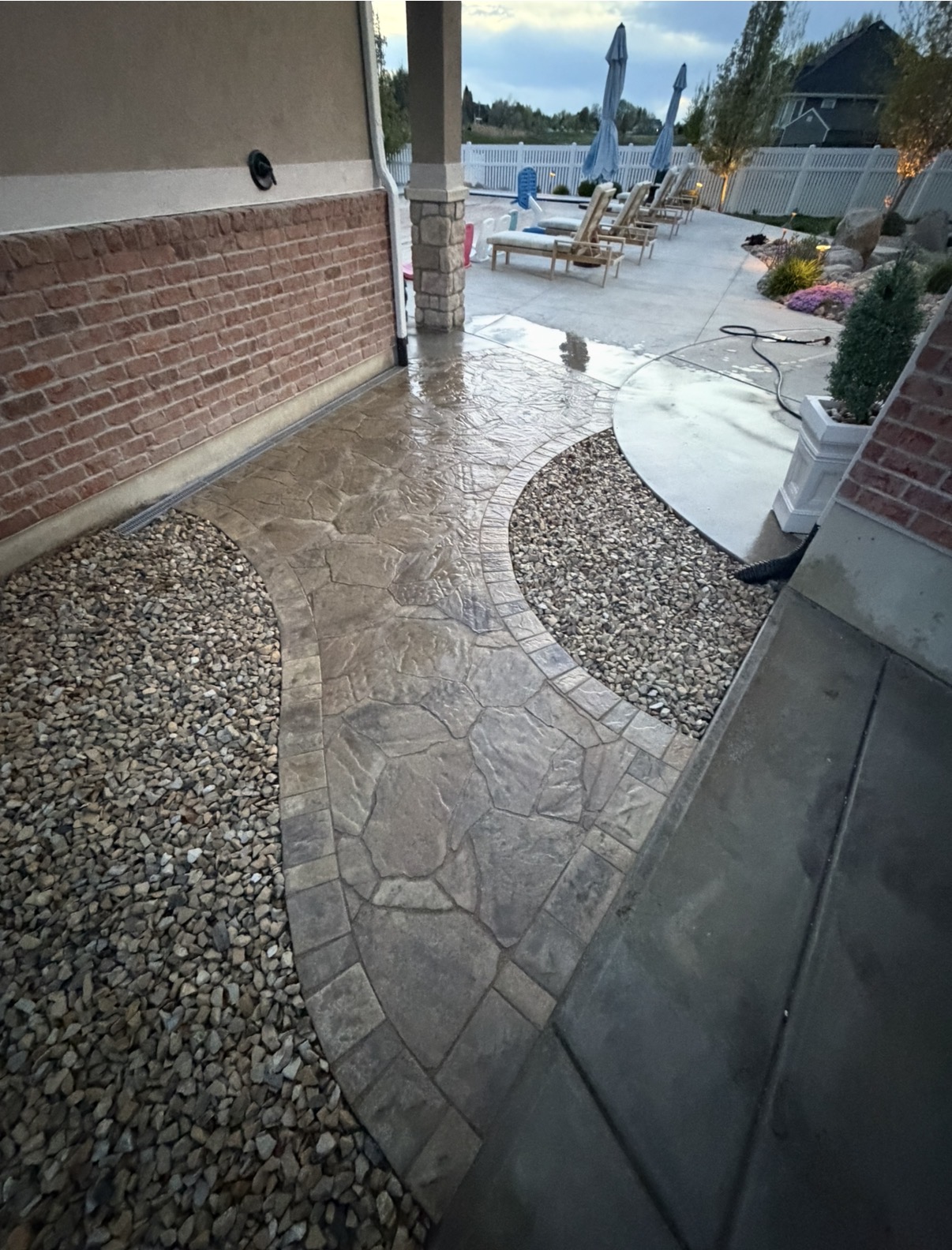 Paver walkway with rock bed accents